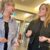 Two colleagues engaged in discussion, capturing how collaboration drives impactful digital strategies.